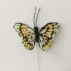 Lille lys dekorativ sommerfugl