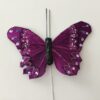 Mørk lilla sommerfugl