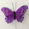 Smuk lilla sommerfugl på ståltråd