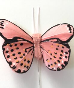 Gammelrosa dekorativ fin sommerfugl