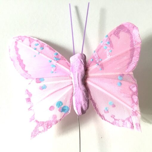 Smuk lille rosa sommerfugl