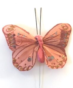 Gammelrosa sommerfugl med glimmerkant