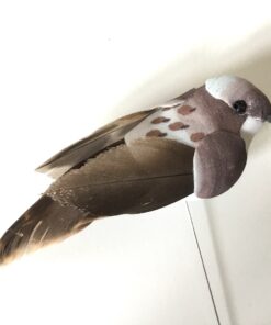 Dekorativ grå brun fugl på pind